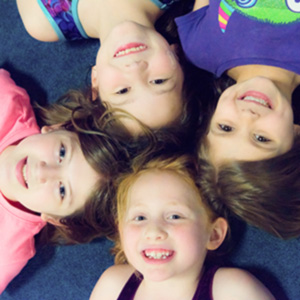 classes picture Picture of kids performing stretches